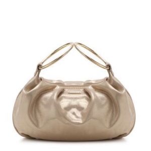 Kate Spade satin cream clutch w ring handles